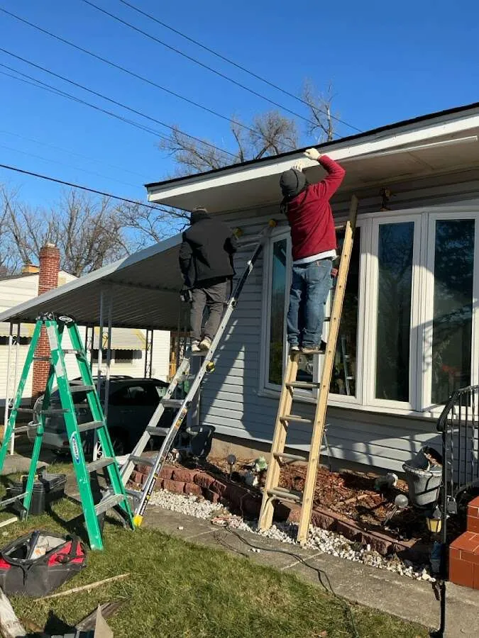 Restoration crew performing exterior repair in Fort Meade